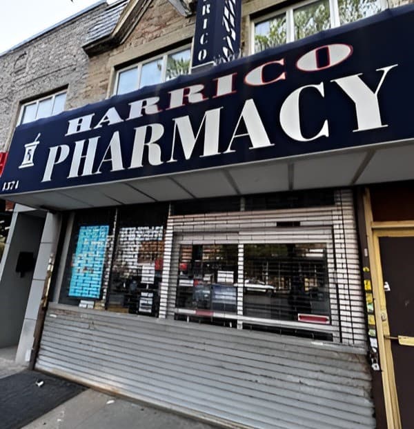 pharmacist greeting a patient inside Harrico Galler